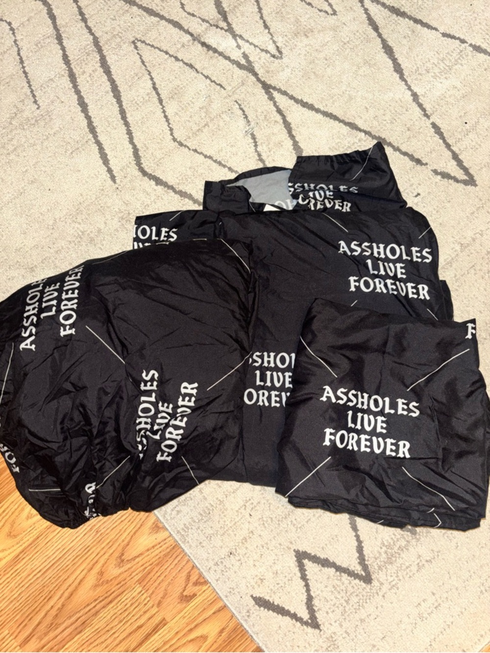 Full sheet set with "A$$HOLES LIVE FOREVER" Print